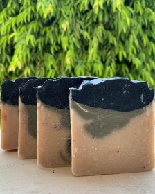 Cleansing soap with activated carbon and green clay